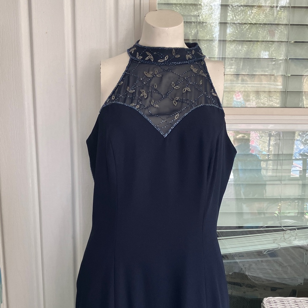 Absolutely Stunning Navy Blue Floor Length Halter Dress With intricate detail.